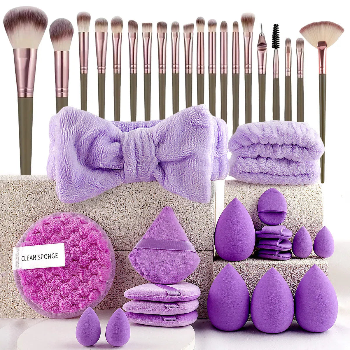 Hydrophilic non-latex beauty tools set in brown, pink and purple colours for facial cleansing and makeup