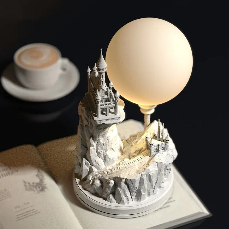 White composite gypsum table lamp with plug and wire switch on a table.