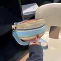 Blue straw woven women's beach bag with zippered pocket and single shoulder strap