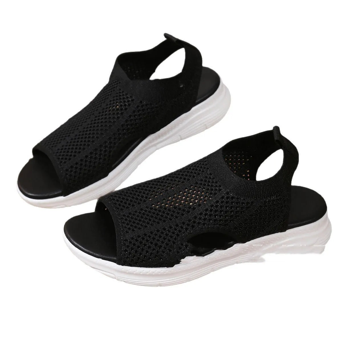 Women's flat platform sports sandals in black with mesh lining and a rubber sole.