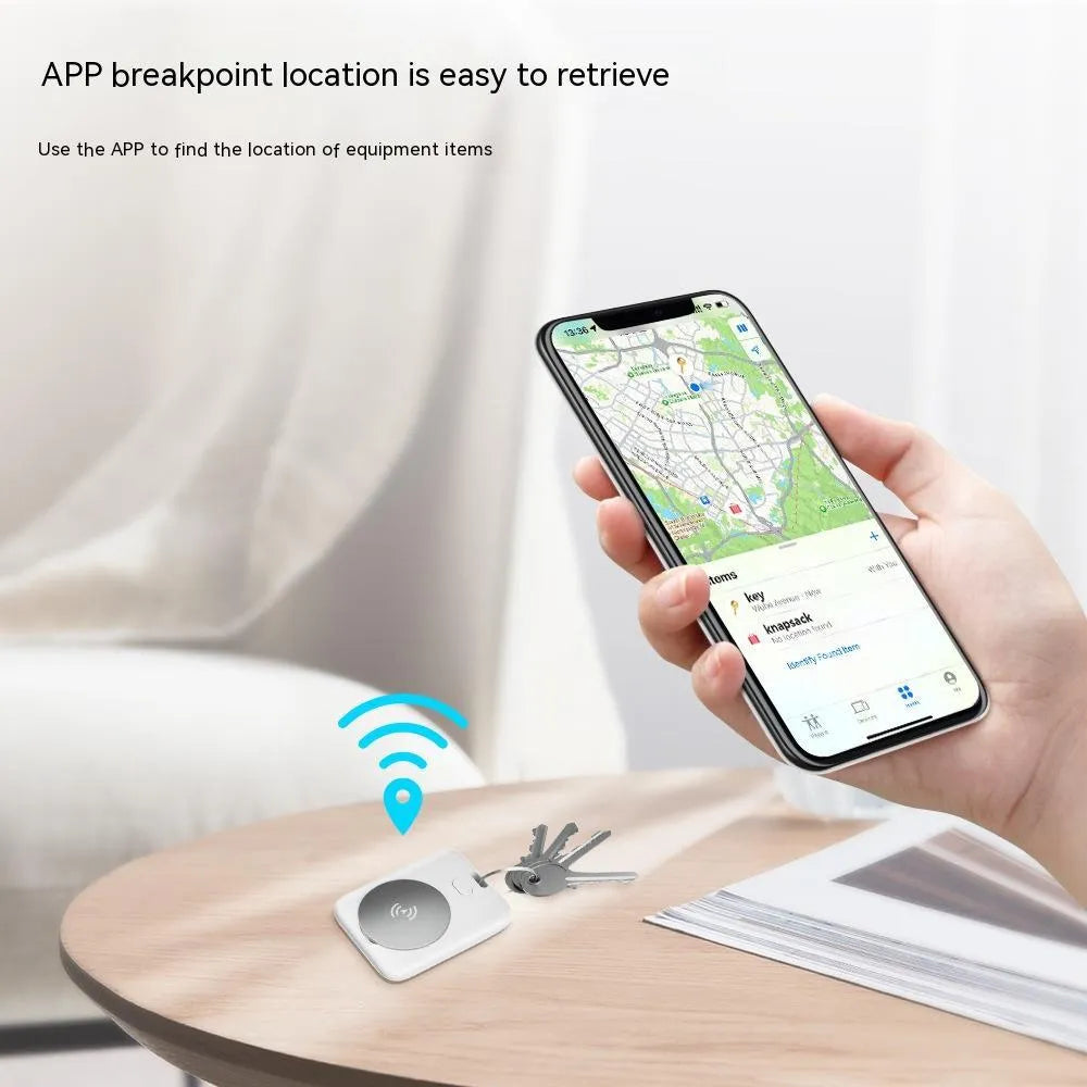 White ABS plastic pet tracking device with a compact, portable design.