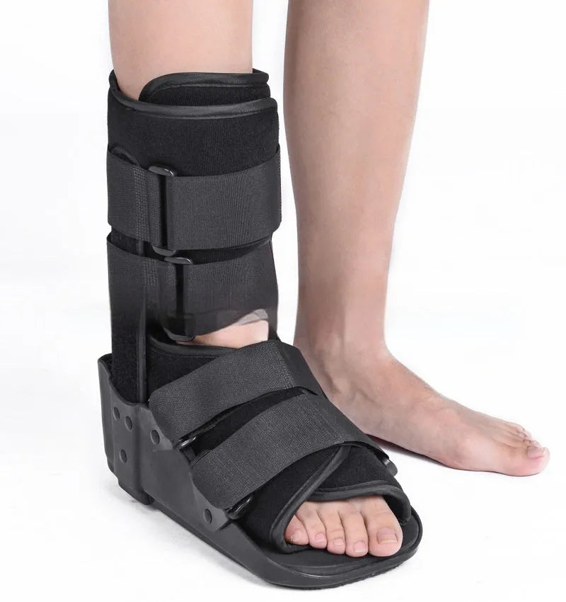 Achilles tendon rehabilitation walking boots in grey and black colours with adjustable straps