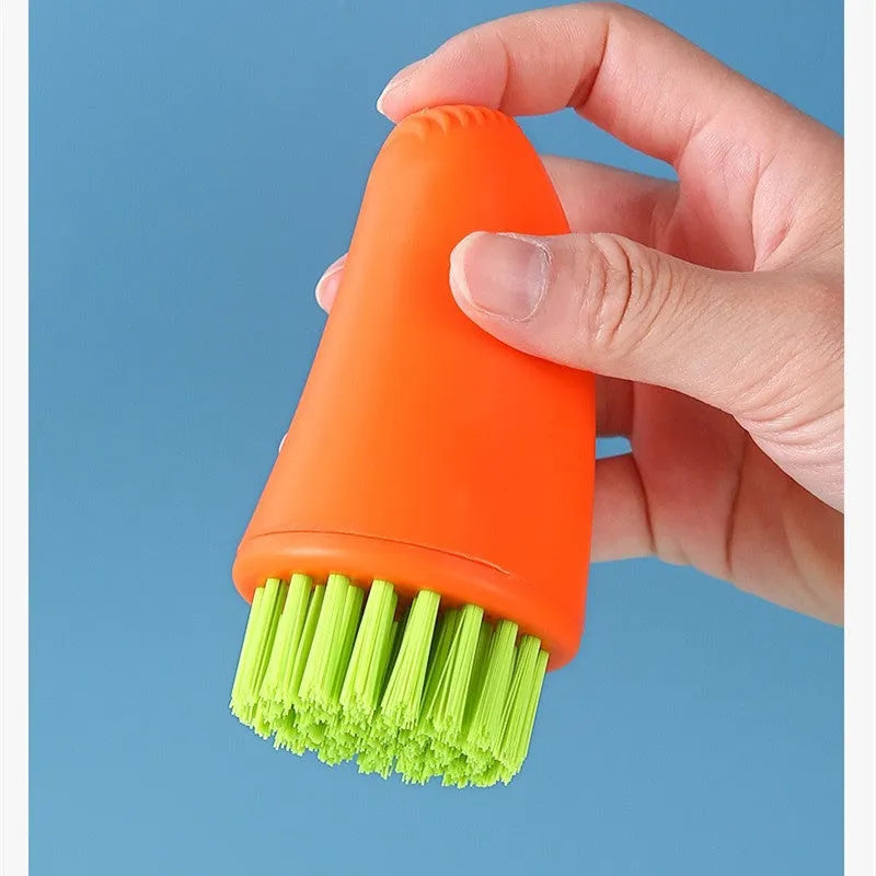 White and orange carrot-shaped nylon cleaning brush for kitchen use