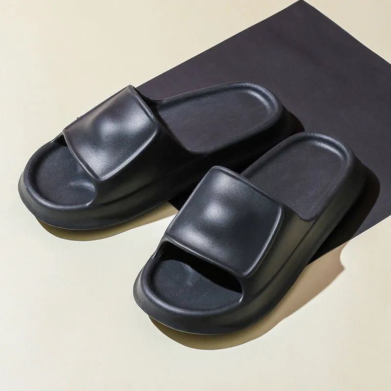 Pair of thick-soled EVA foam flip-flop slippers in a choice of seven colours.