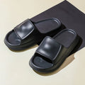 Pair of thick-soled EVA foam flip-flop slippers in a choice of seven colours.