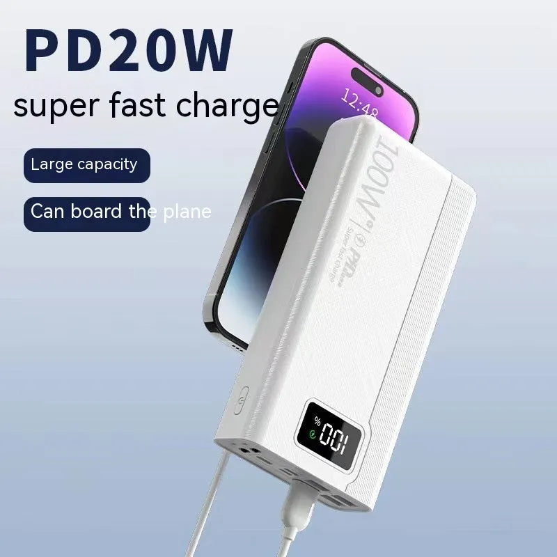 Large capacity power bank in black or white plastic casing with compact dimensions