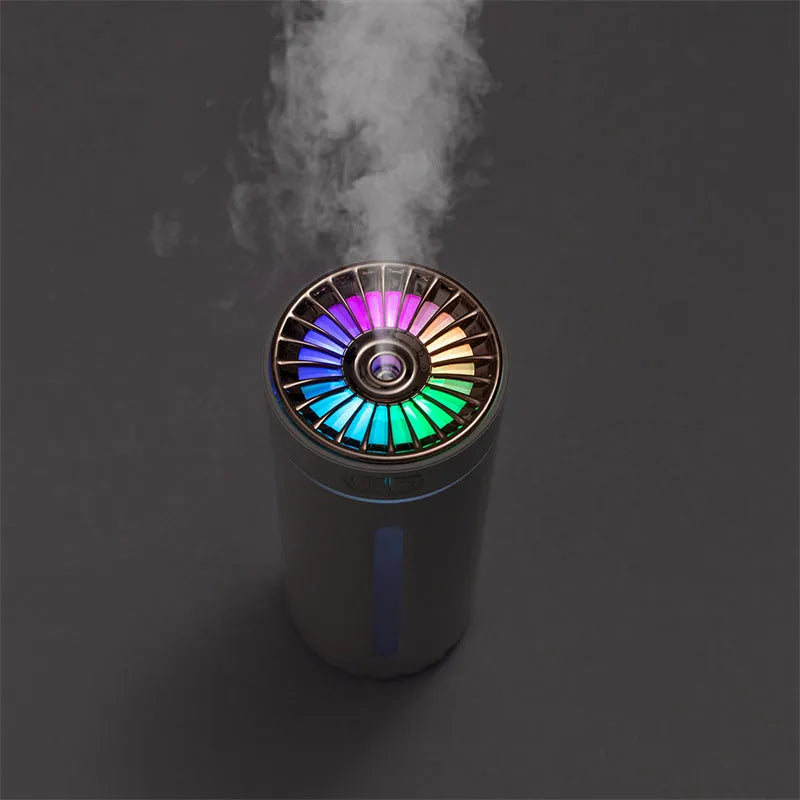 Black wireless air humidifier with colourful LED lights on a car cup holder