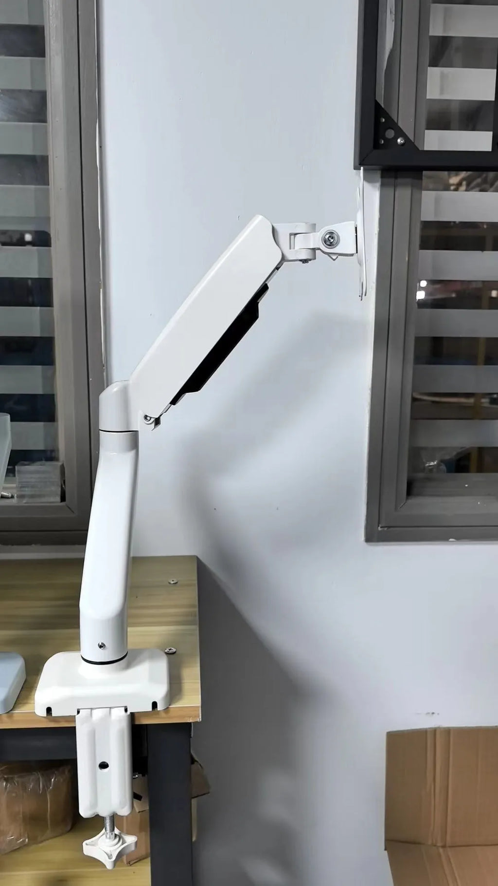 Black LCD screen rotating telescopic bracket elevated rack on table with monitor