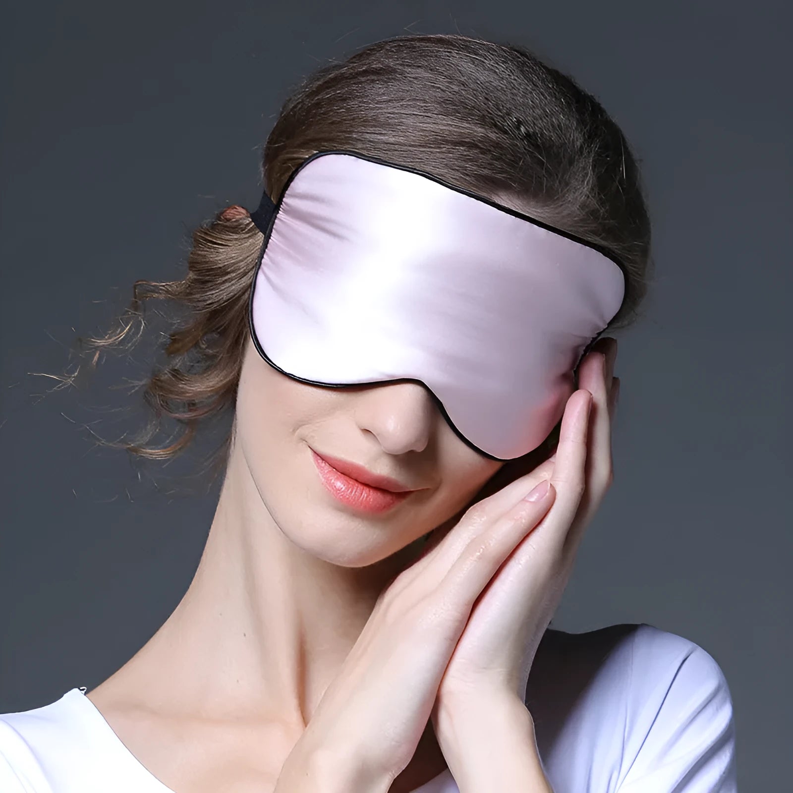 Double-sided mulberry silk sleep eye mask with embroidered printed pattern in various colours.