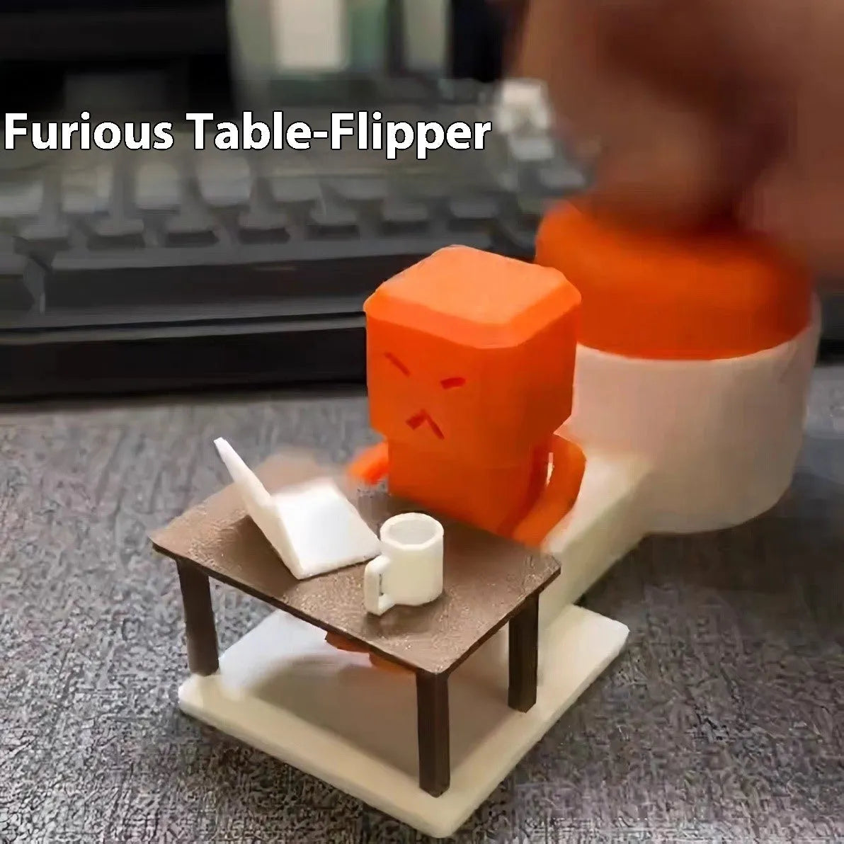 Orange plastic vent decompression toy with push buttons on a desk
