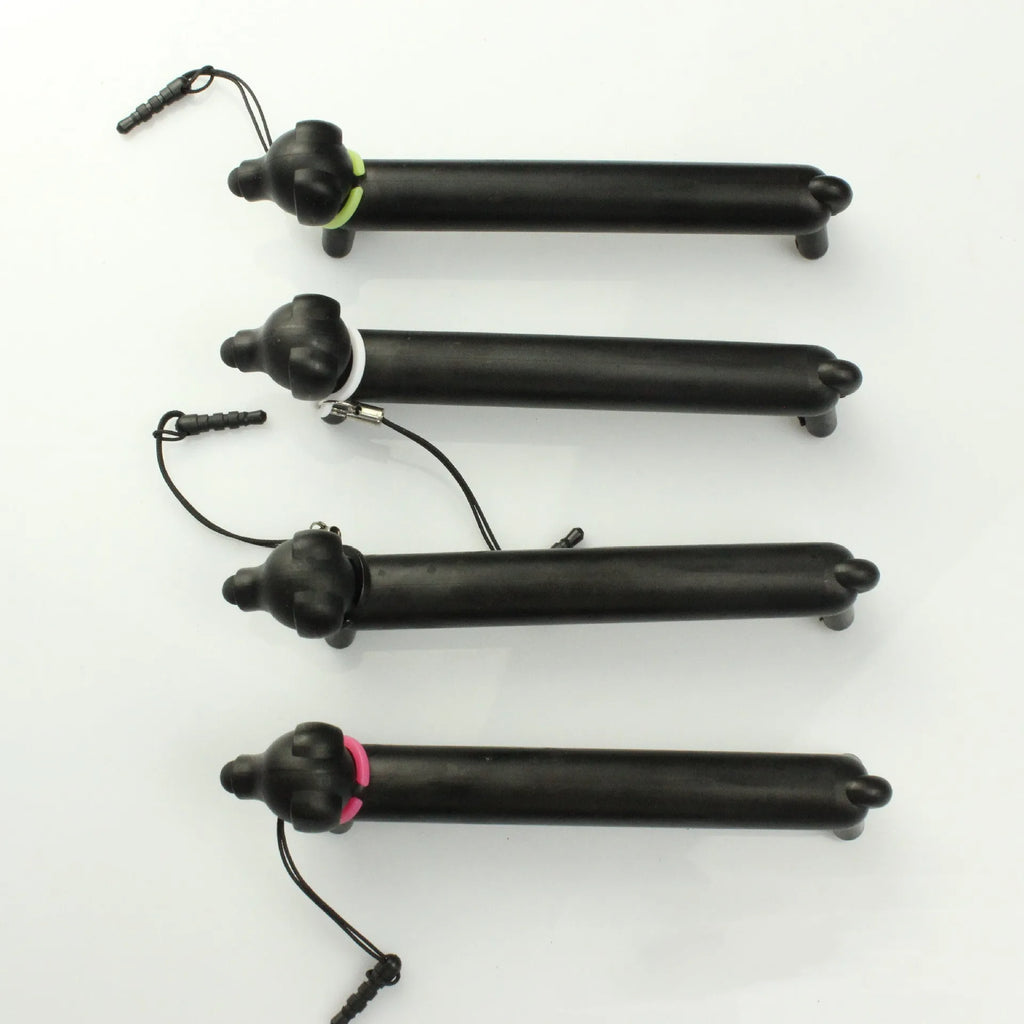 Black dog-shaped touch screen stylus showing dual-length design and phone holder function