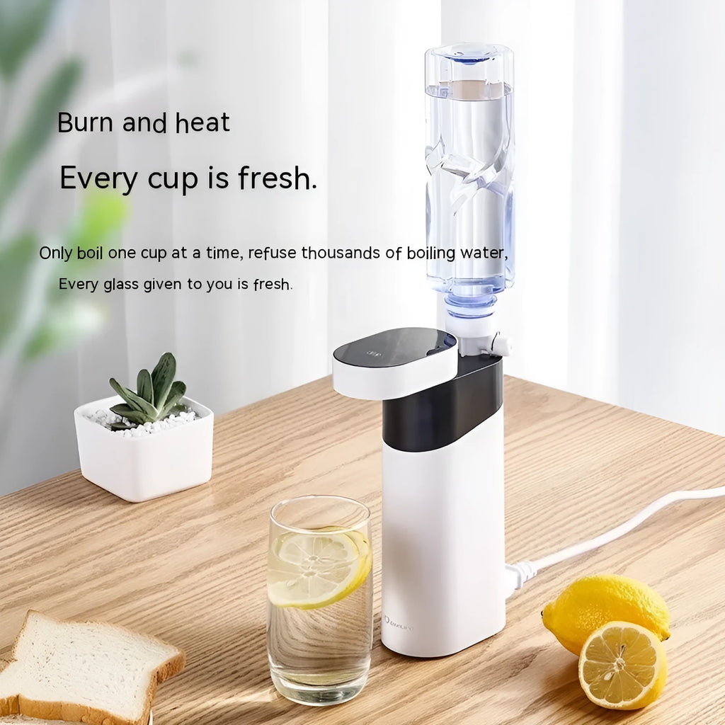 Small black or green desktop instant water dispenser with digital display and nano heating film.