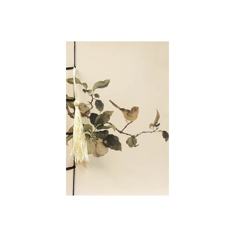 A5 antique wire-bound notebook with glossy embossed cover featuring a retro painting design, shown open.