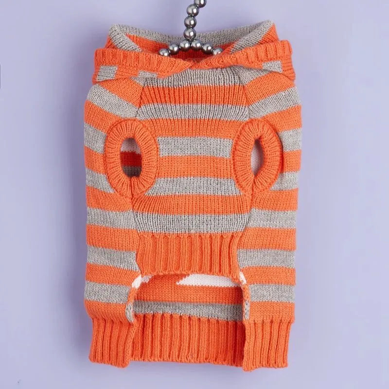 Orange striped Halloween pet sweater with knitted acrylic construction and hooded fur ball detailing