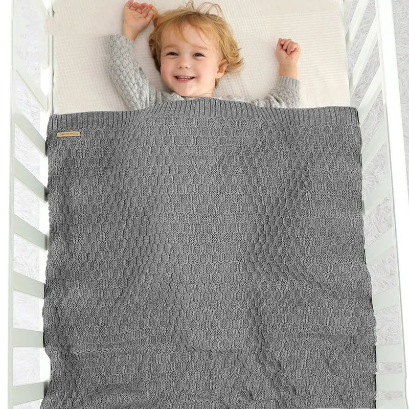 Acrylic infant hug blanket with three-dimensional lines measuring 70×90cm in solid colour options