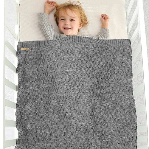 Acrylic infant hug blanket with three-dimensional lines measuring 70×90cm in solid colour options