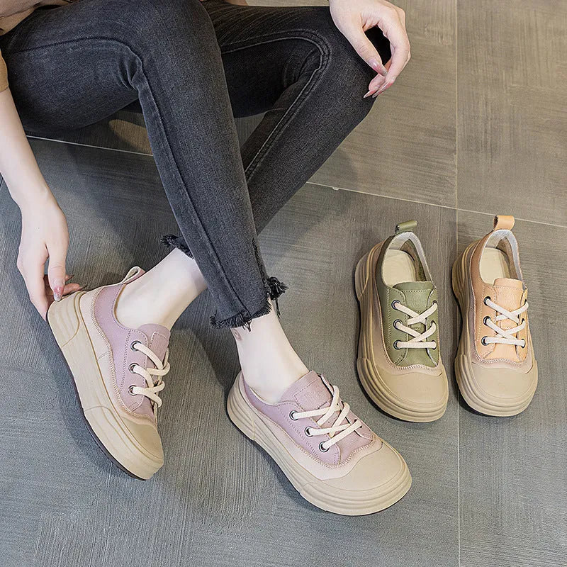 Women's matcha green leather platform sneakers with round toe and front laces on a white background.